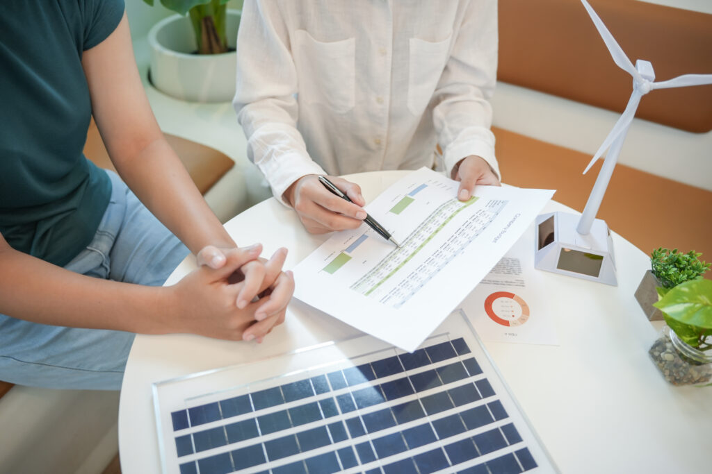 Homeowner comparing local and online options to buy solar panels in Nova Scotia